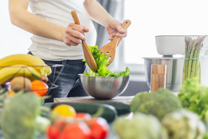 Pregnant women cooking healthy food